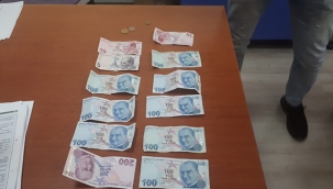 Kadın dilencinin üstünden