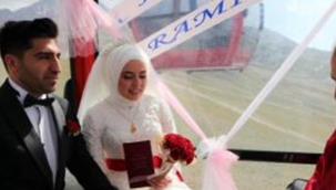 Teleferikte dunya evine girdiler.
