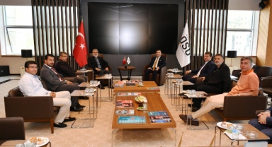 Enerji ve Tabi Kaynaklar Bakanı Taner Yıldız, Kayseri OSB Başkanı Mehmet Yalçın'ı ziyaret etti