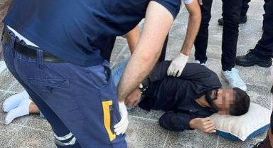 Hakkında 5 yakalama emri bulunan şüpheli polisi görünce 2. kattan atladı