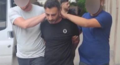 Firari katil, 18 yıl sonra çöp atarken aynı polislere yakalandı