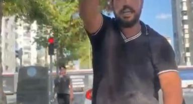 Cam silme bahanesiyle aracın kaputuna yatıp zorla para istemişti, tutuklandı