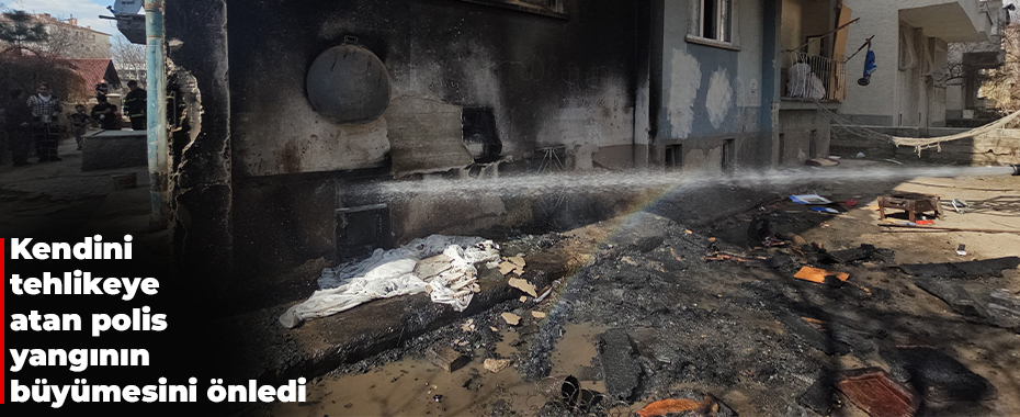 Kendini tehlikeye atan polis yangının büyümesini önledi
